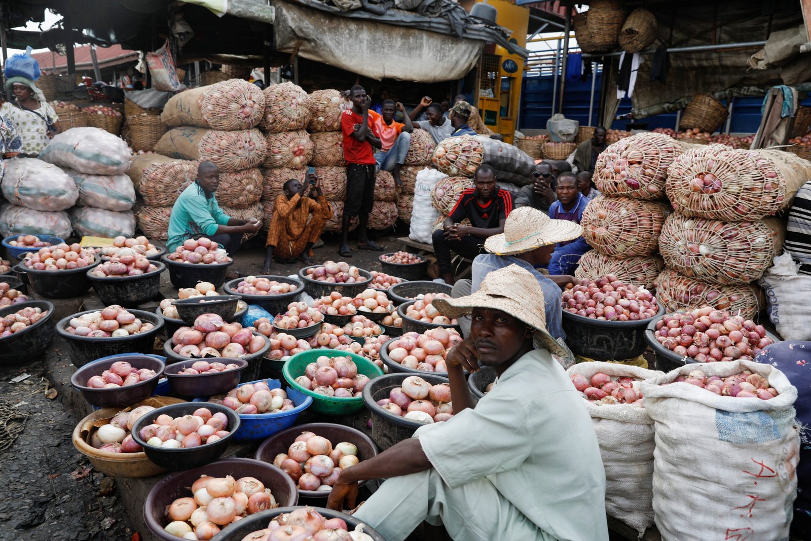 1747325799424 b17e6 2022 05 16t122551z 512408997 rc29 c4ktu rtrmadp 3 nigeria inflation scaled